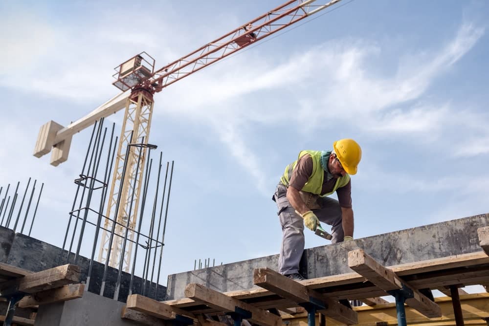 Skilled shuttering carpenter working on a construction site